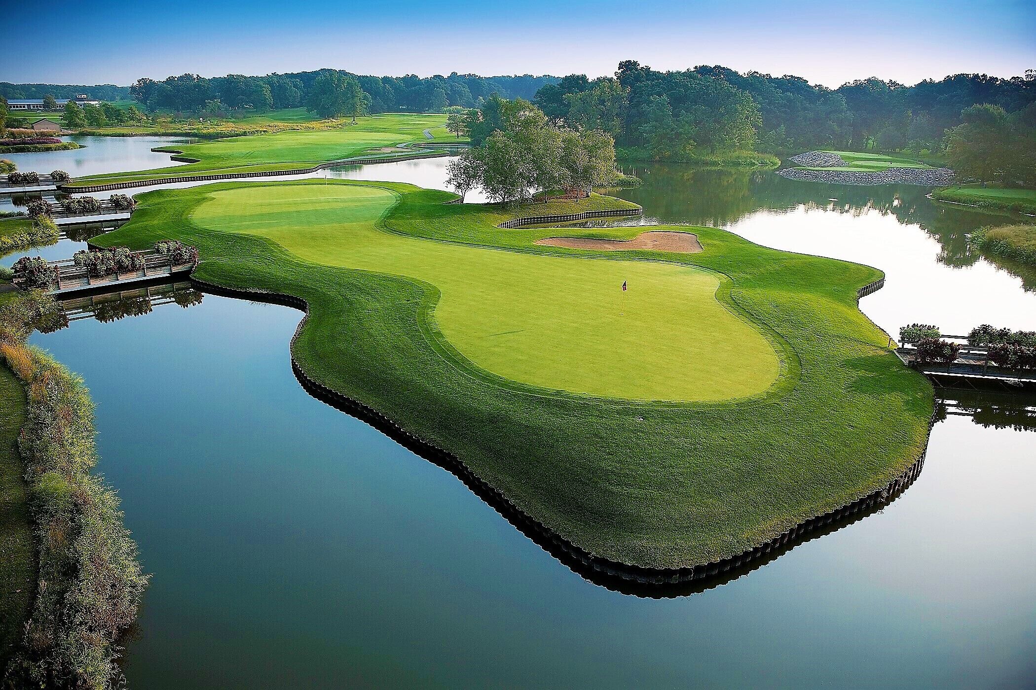 Tee off nearby and enjoy serene greens and water views.