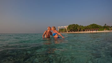 Playa privada y playa de arena blanca