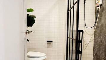 Hair dryer, towels, soap, shampoo