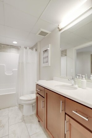 Bathtub, hair dryer, towels - Sojourn | VA Square | 2 BR (Arlington)