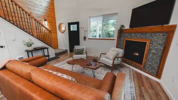 Smart TV, fireplace, books, music library