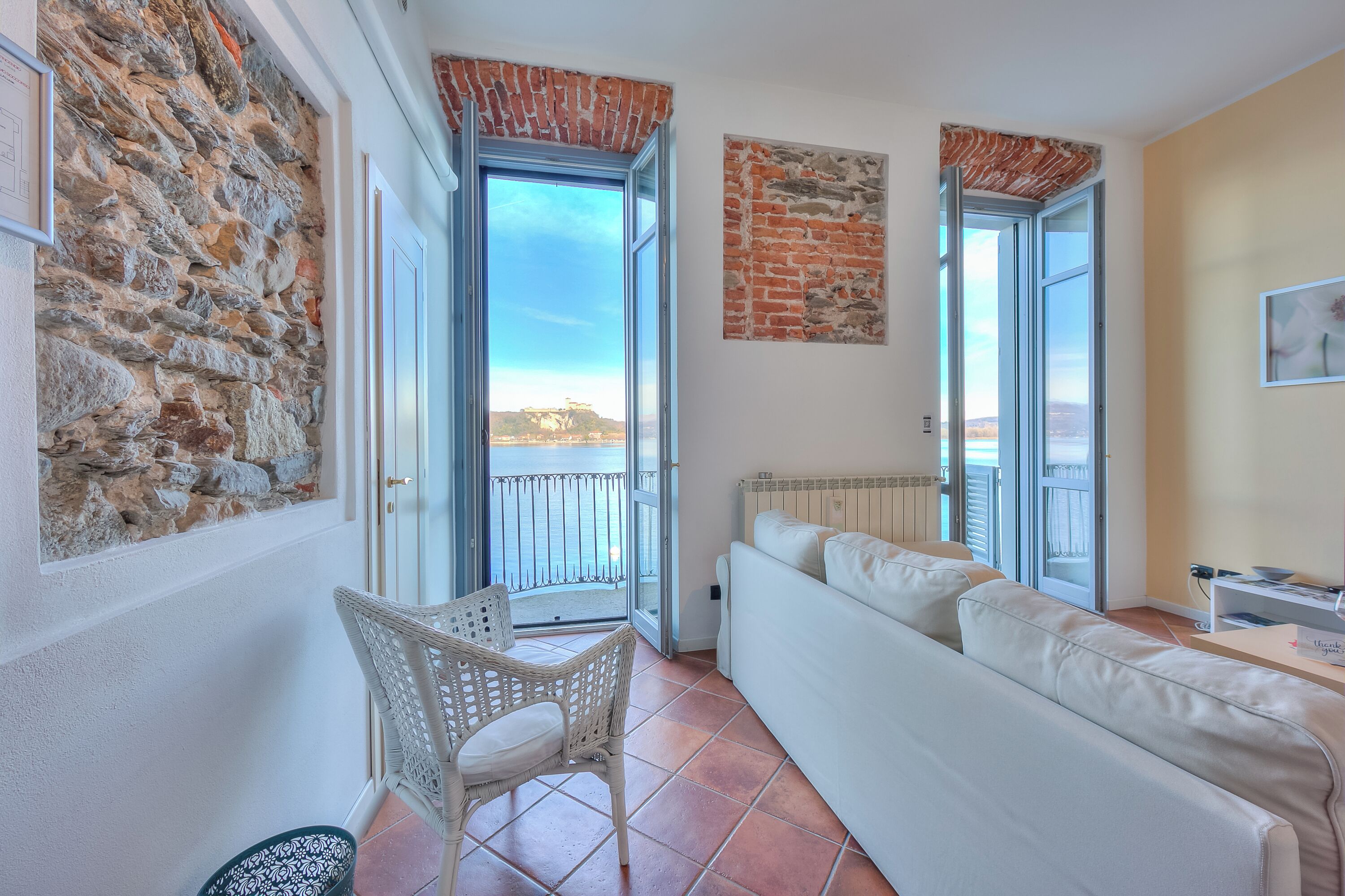 Honeymoon Apartment, Multiple Bedrooms, 2 Bathrooms, Lakeside (La Dolce Vita Pied dans L' Eau) | Living area | 21-inch flat-screen TV with digital channels