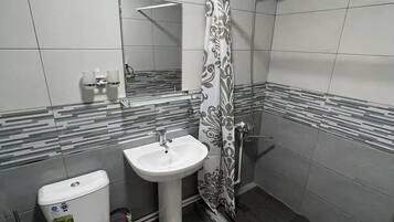 Hair dryer, towels, soap, shampoo