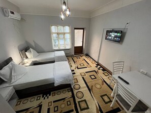 1 chambre, fer et planche à repasser, Wi-Fi, draps fournis