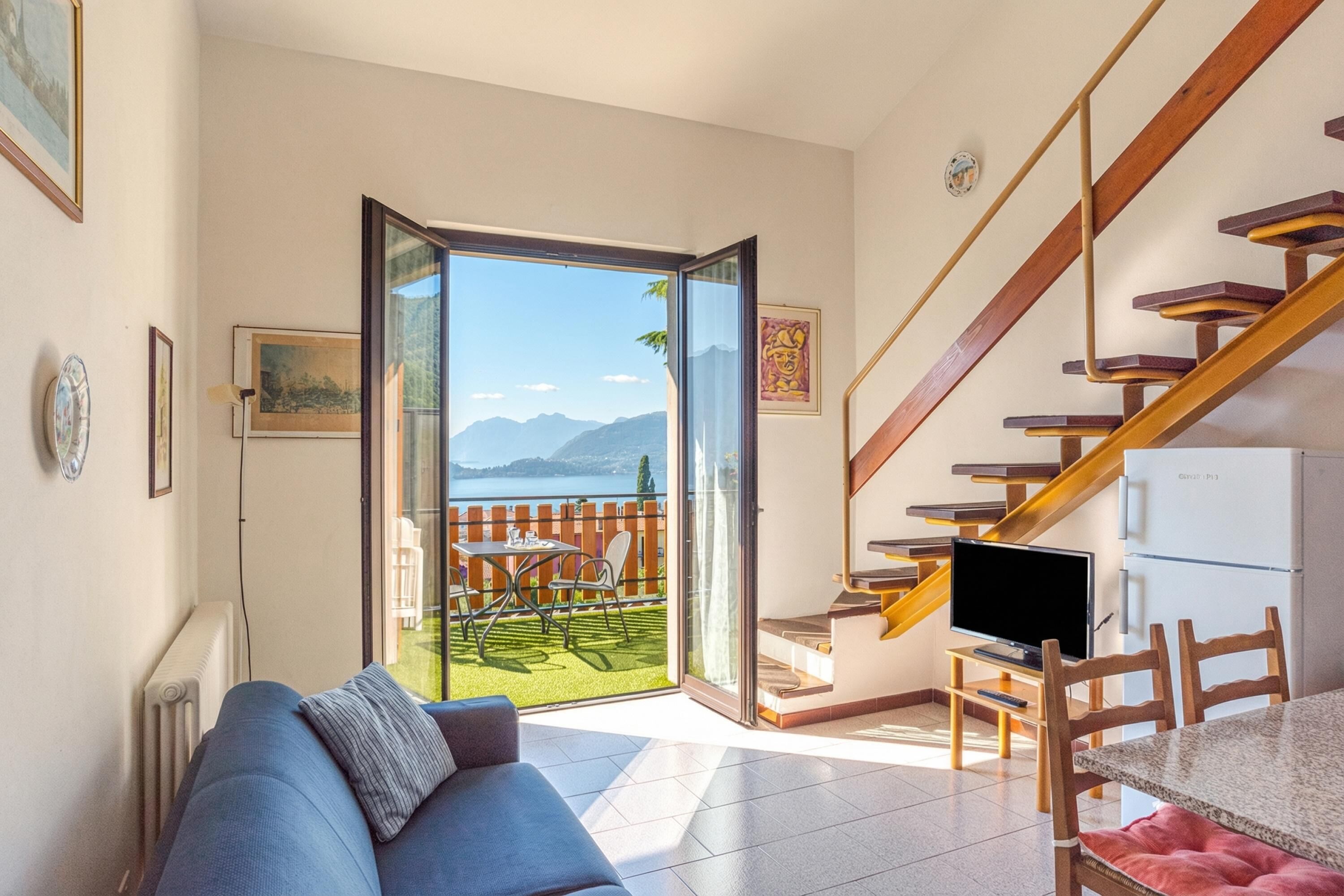 Honeymoon Apartment, Multiple Bedrooms, Mountainside (CO.RI. Appartamenti 5) | Living area | 21-inch Smart TV with satellite channels