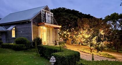 Stunning 180° views of lush rolling hills and the sea, close to the beach