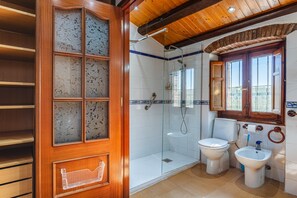 Bathtub, hair dryer, towels