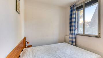 2 habitaciones, tabla de planchar con plancha y wifi gratis