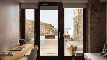 Two Bedroom Suite With Pool | Living area | 43-inch flat-screen TV with satellite channels, Netflix