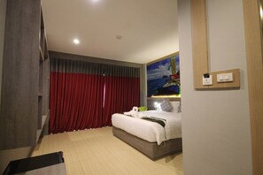 Deluxe-rum | Duntäcken, memory foam-madrasser och värdeförvaringsskåp på rummet