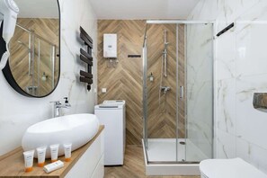 Dutxa, assecador de cabells i tovalloles 