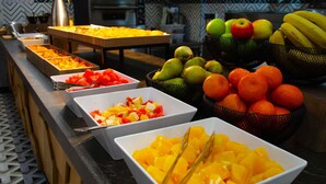 A buffet with various fruits and vegetables. - Ibis Kyiv Beresteiska (Kyiv)
