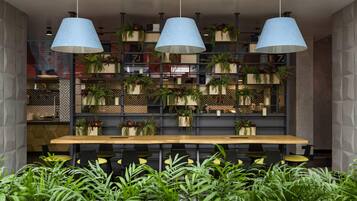 Breakfast, lunch, dinner served; international cuisine