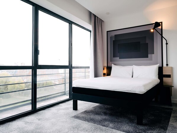 Laptop workspace, blackout curtains, iron/ironing board