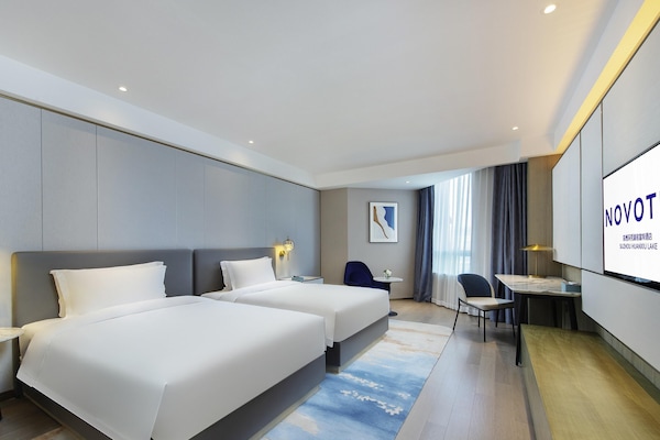 Deluxe Room, 2 Twin Beds | Down comforters, free minibar, in-room safe, blackout drapes
