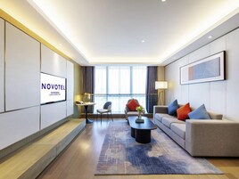 Deluxe Suite, 1 King Bed | Down comforters, minibar (free items), in-room safe, blackout drapes