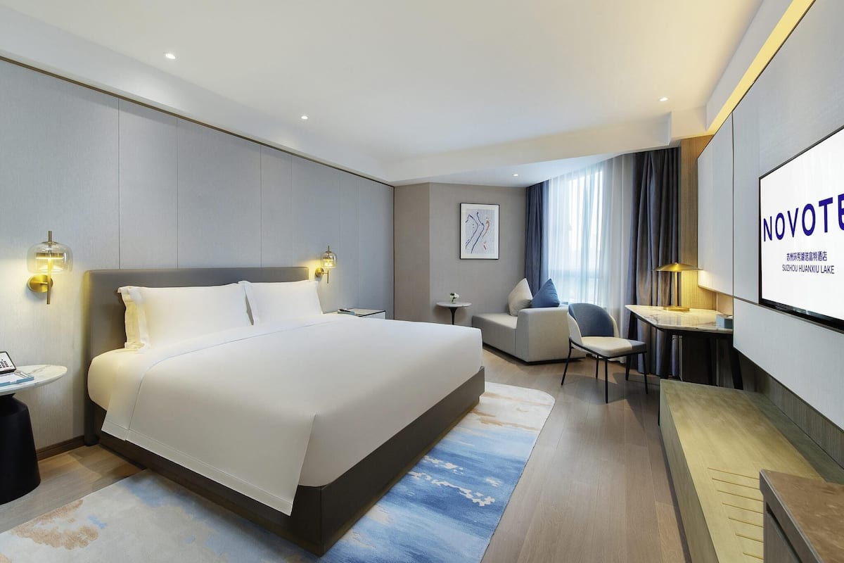 Couette en duvet, articles de minibar gratuits, coffre-fort