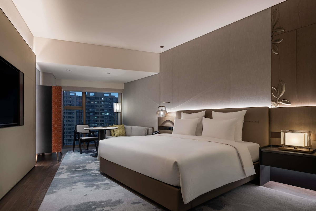 Ropa de cama de alta calidad y minibar 