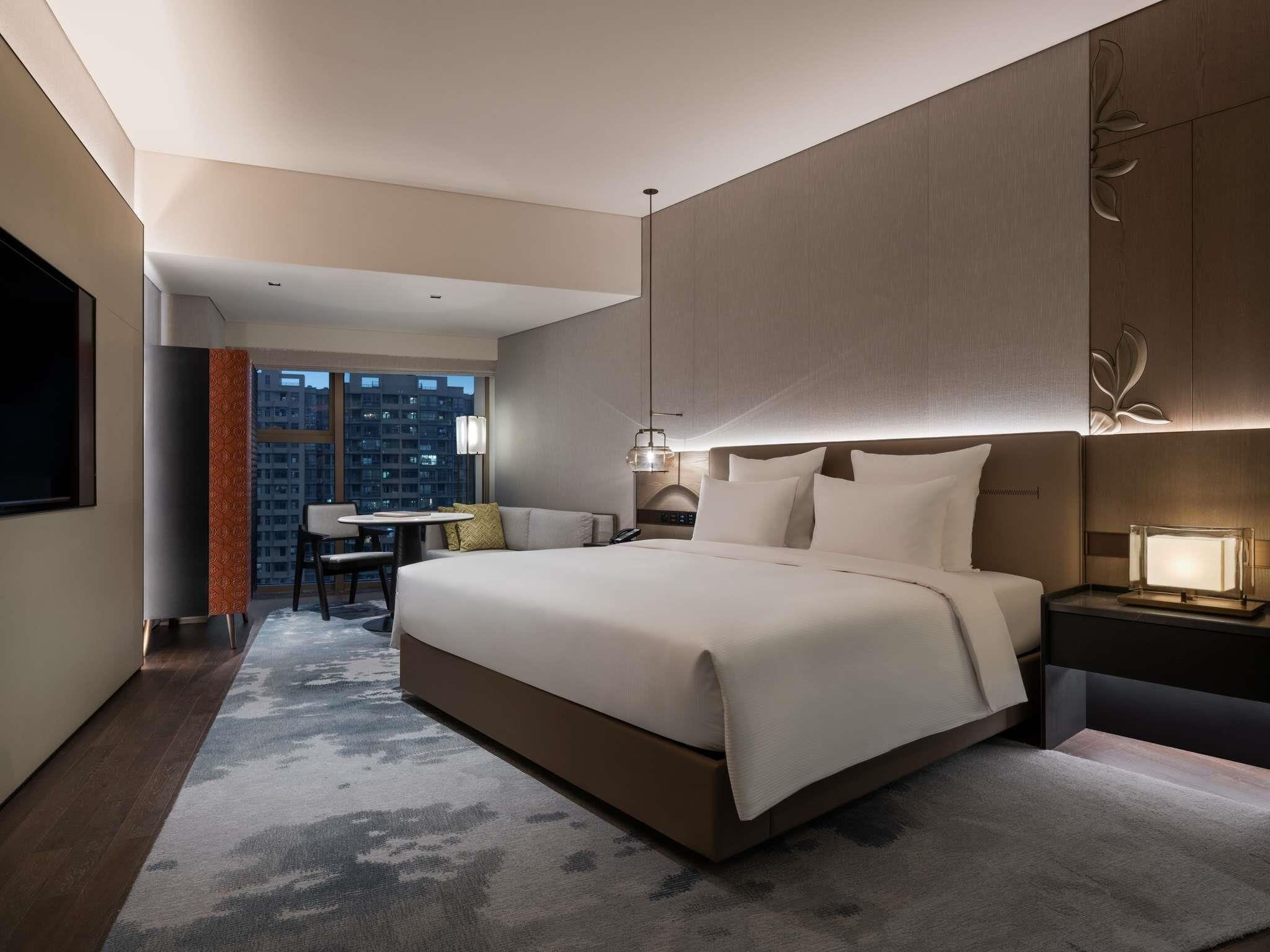 Ropa de cama de alta calidad y minibar 