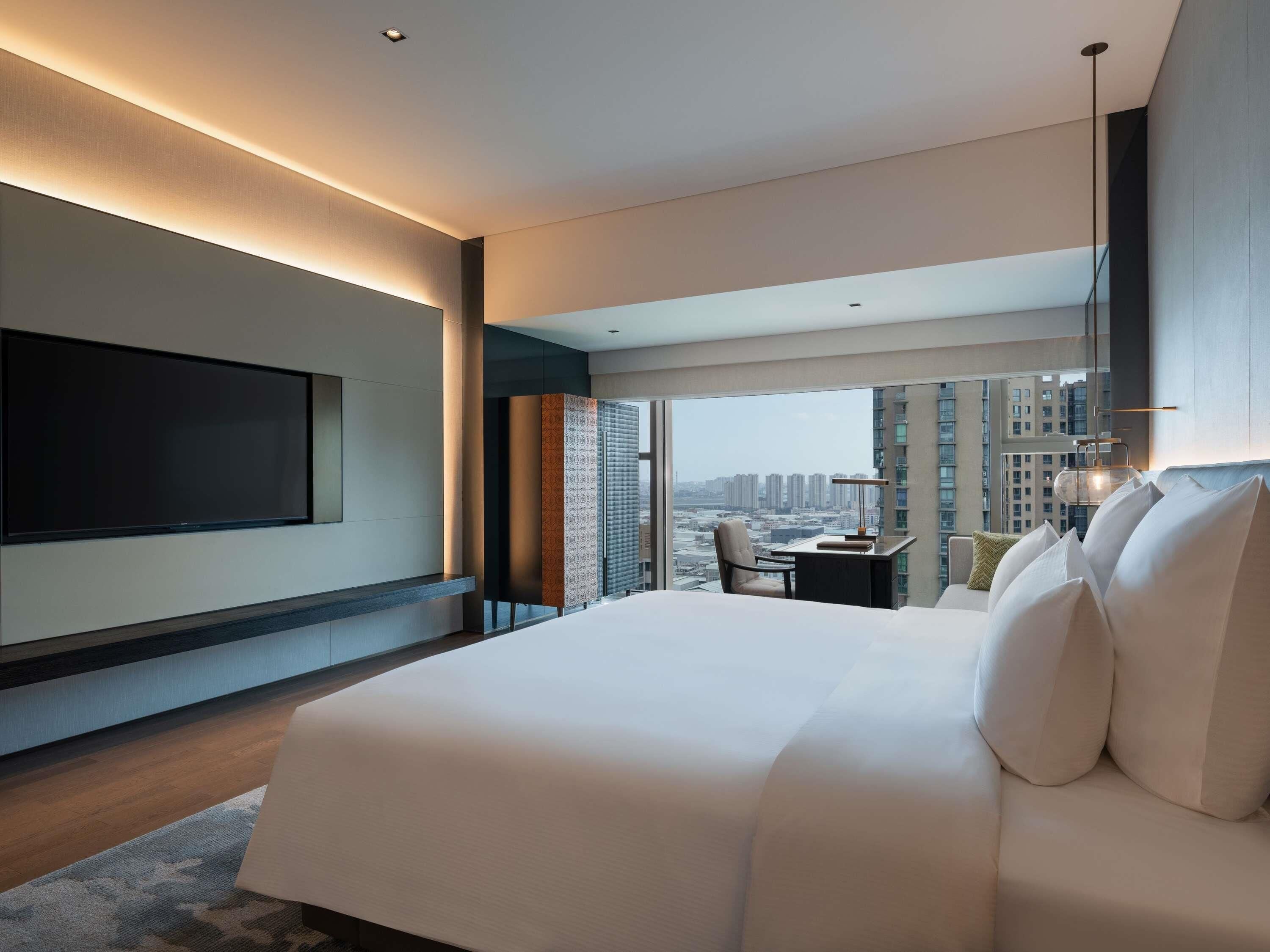 Ropa de cama de alta calidad y minibar 