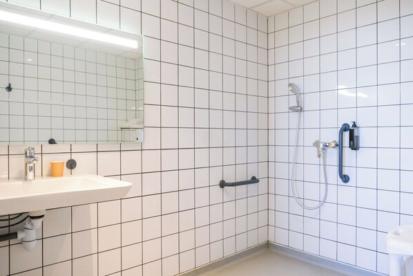 Standard Room, Multiple Beds | Bathroom | Shower, rainfall showerhead, hair dryer, towels