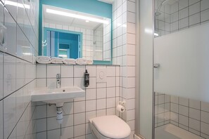 Shower, rainfall showerhead, hair dryer, towels