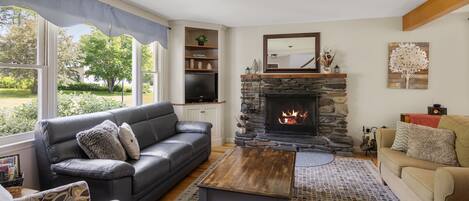 Smart TV, fireplace, foosball, books