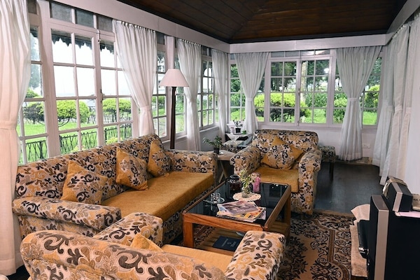 32-inch LED TV with premium TV channels, fireplace