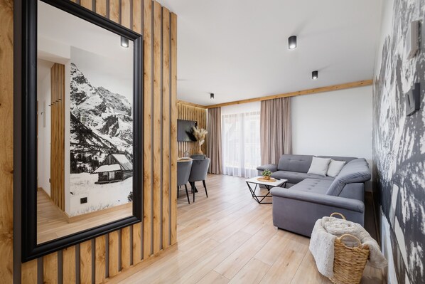 Apartment, 1 Schlafzimmer, Kamin, Bergblick | Wohnzimmer | Kamin