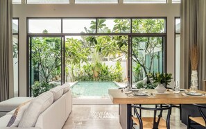 ALANNA 2 Bedroom Signature Pool Villa | Living area | 50-inch Smart TV with digital channels, toys - VILLA ALANNA Phuket (Choeng Thale)