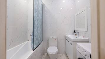 Jetted tub, hair dryer, bidet, towels