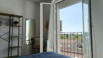 1 bedroom, desk, iron/ironing board, travel crib
