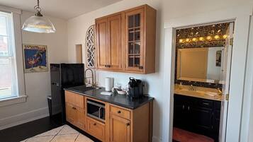 Fridge, microwave, coffee/tea maker, toaster