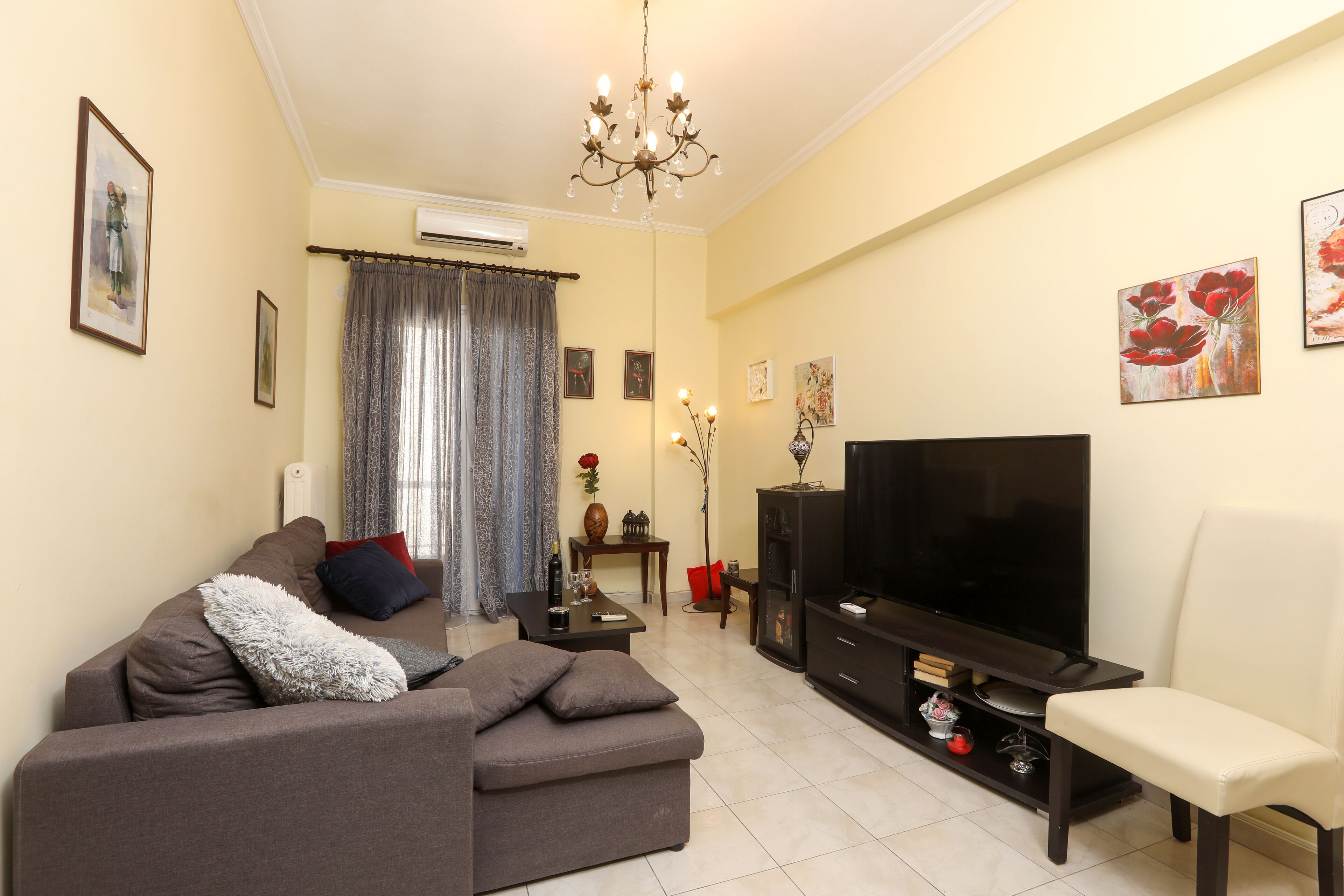 City Apartment | Living area | 45-inch LCD TV with cable channels