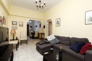 City Apartment | Living area | 45-inch LCD TV with cable channels - Annie's House by Corfuescapes (Corfu)