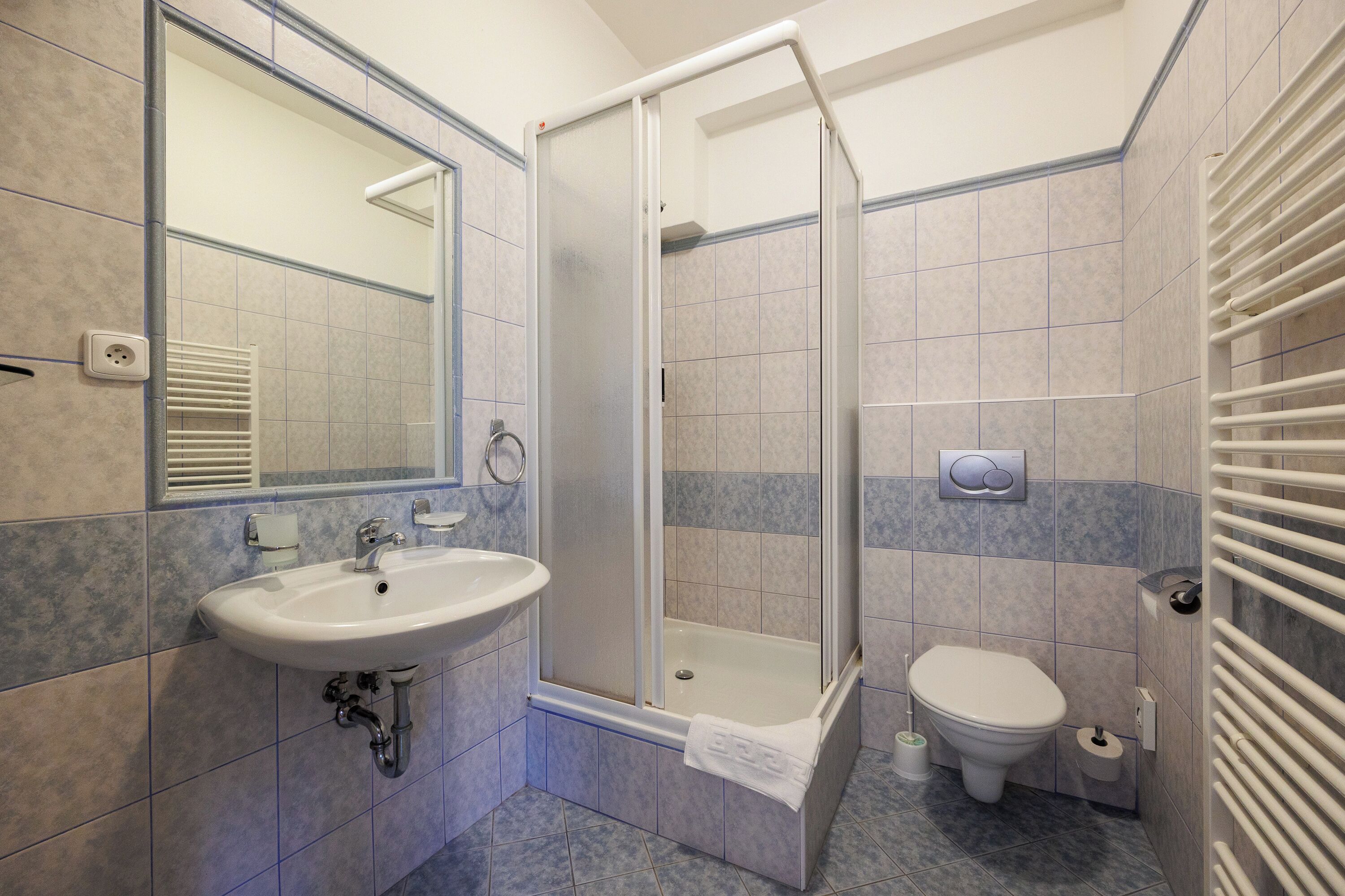 Shower dan handuk