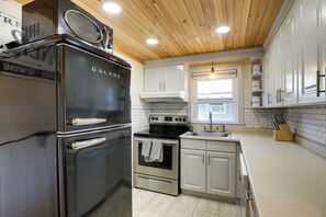 Microwave, oven, stovetop, dishwasher - Riverfront New Hampshire Cottage w/ Boat Dock (Manchester)