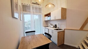 Fridge, microwave, coffee/tea maker, electric kettle