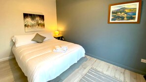 4 bedrooms, desk, iron/ironing board, travel cot