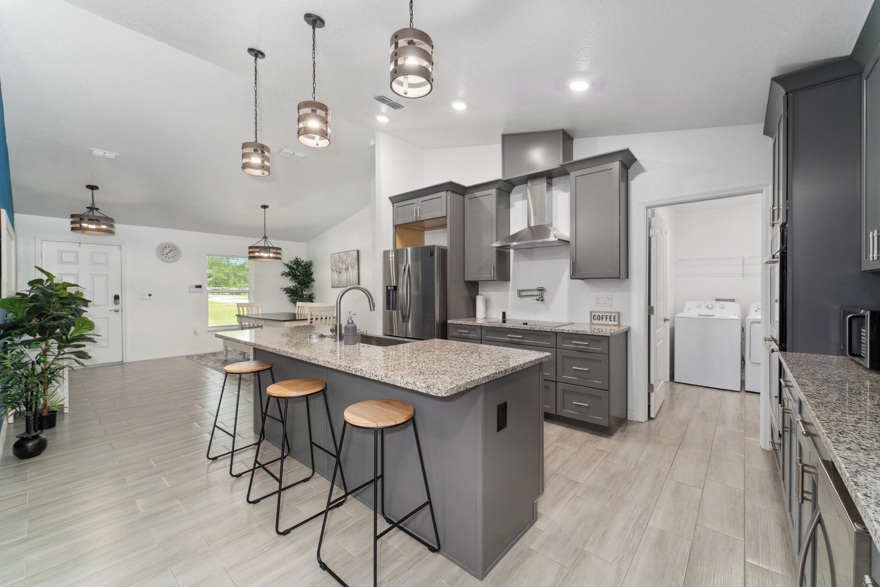 Fridge, stovetop, dishwasher, coffee/tea maker