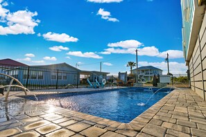 A heated pool - Dog-friendly with Gulf view, pool, balcony, deck, fireplace, central AC, & W/D (St. George Island)