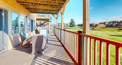 Golf course-front condo with pool, hot tub, dock, tennis, golf, & private beach