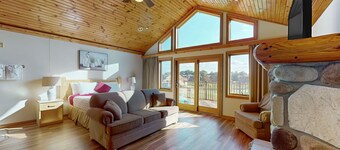 Golf course-front condo with pool, hot tub, dock, tennis, golf, & private beach