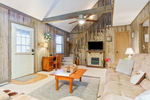 Delightful creekside cabin w/ spacious deck, private hot tub, fire pit, & views