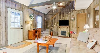 Delightful creekside cabin w/ spacious deck, private hot tub, fire pit, & views