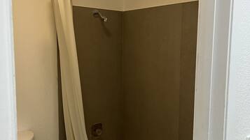 Standard Room, Non Smoking, Refrigerator & Microwave | Bathroom | Combined shower/bathtub, rainfall showerhead, towels