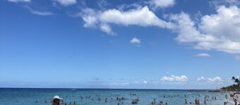 Spacious and relaxing with an amazing town skyline and far island & ocean view.