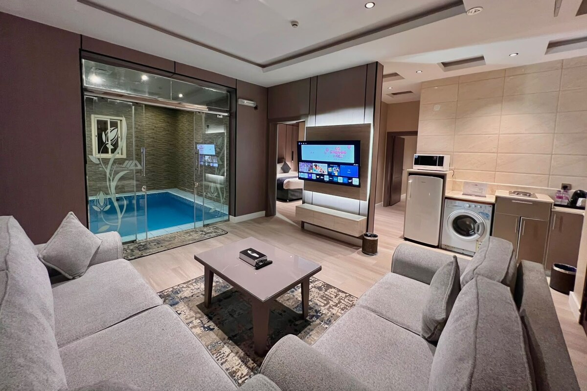 Chalet, 2 Bedrooms | Living area | 55-inch flat-screen TV with satellite channels