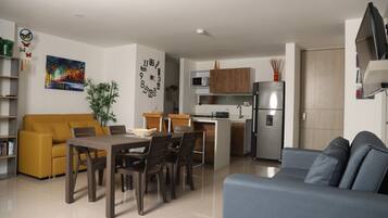 Apartment | Living area | 50-inch Smart TV with digital channels, Netflix, iPod dock