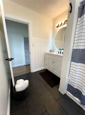 Hair dryer, towels, soap, shampoo